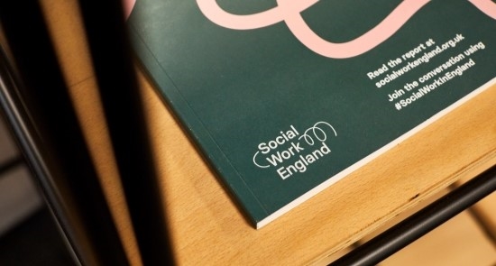 Book with Social Work England logo)